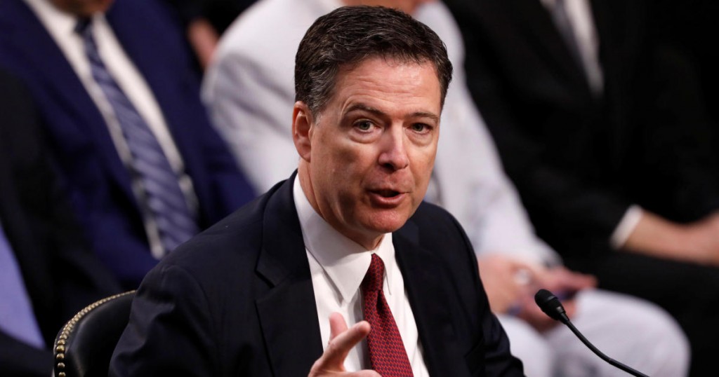 FILE PHOTO: Former FBI Director James Comey testifies before a Senate Intelligence Committee hearing on Russia's alleged interference in the 2016 U.S. presidential election on Capitol Hill in Washington