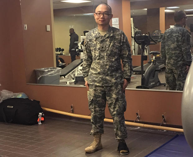 This photo provided by Panshu Zhao shows Zhao in uniform on Feb. 11