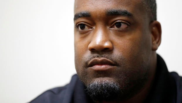 Mark Hughes takes part in an interview at his attorney's office