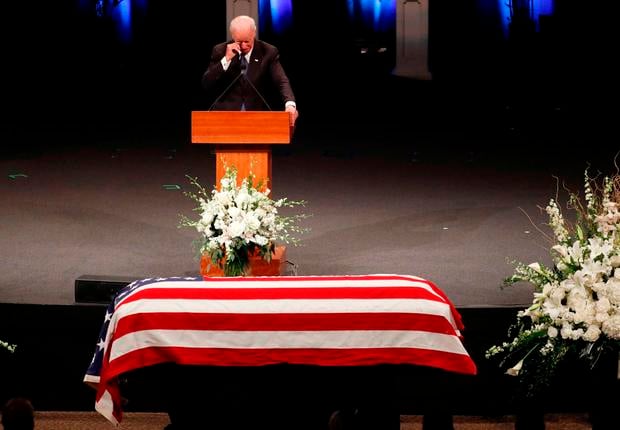 Former US Vice President Joe Biden wipes a tear while giving a tribute during memorial service at North Phoenix Baptist Church for US Senator John McCain on August 30