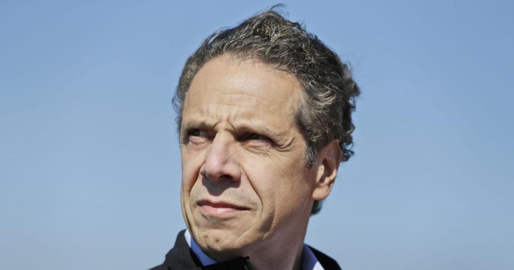 New York Governor Andrew Cuomo watches as a large crane named the Left Coast Lifter arrives at the Tappan Zee Bridge near Nyack