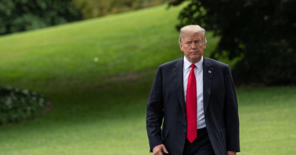 US President Donald Trump walks to board Marine One at the White House in Washington