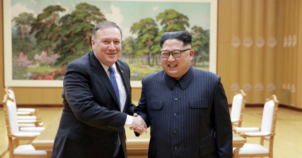 North Korean leader Kim Jong Un shakes hands with U.S. Secretary of State Mike Pompeo in this May 9