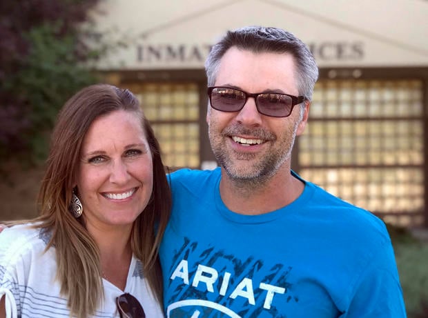 CORRECTS DATE TO AUG. 3-This photo provided by the Oregon Justice Resource Center shows Josh Horner with his wife Kelli Horner after his release from the Deschutes County Jail in Bend