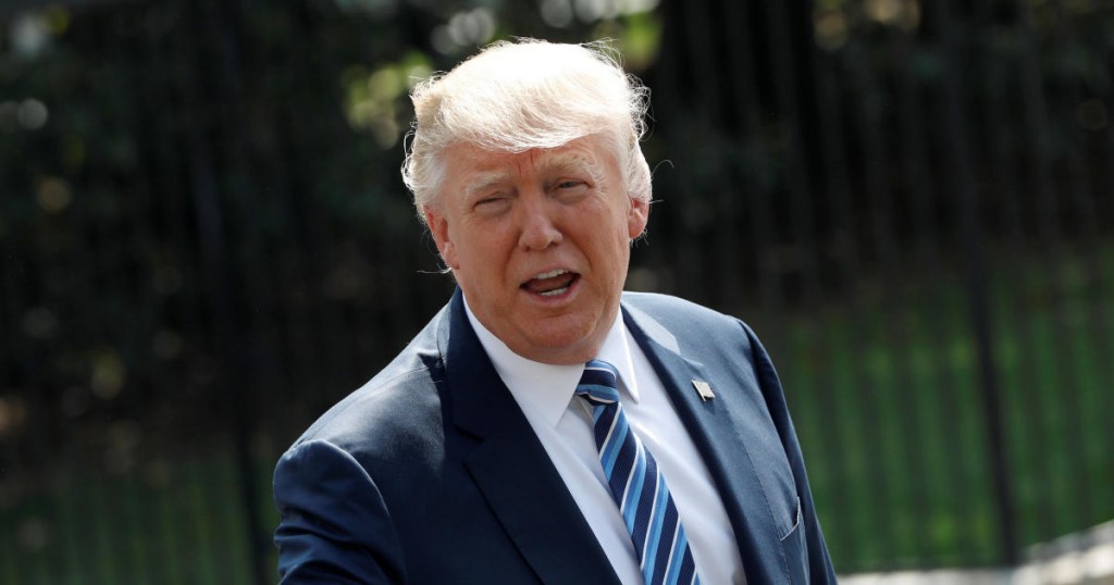 U.S. President Donald Trump speaks to reporters following a signing ceremony with Treasury Secretary Steve Mnuchin at the Treasury Department in Washington