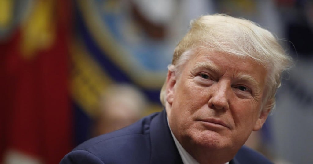 President Donald Trump listens during a discussion for drug-free communities support programs