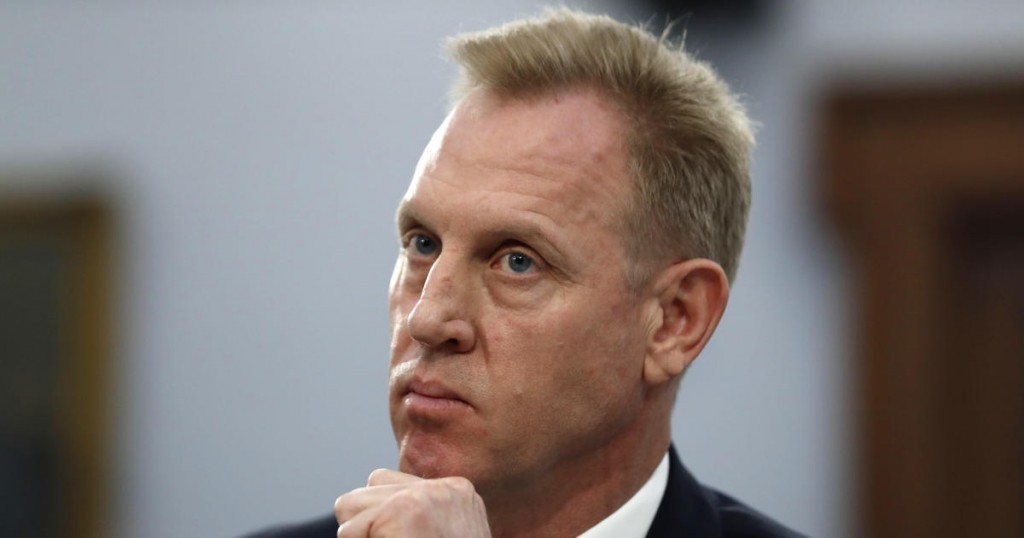 Acting Defense Secretary Patrick Shanahan listens