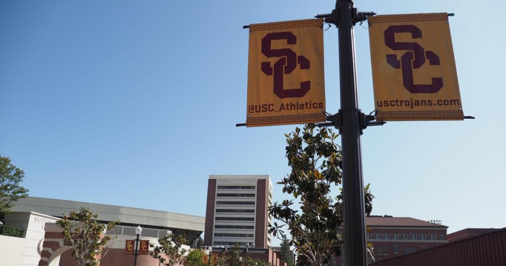 A young man rides a bicycle on the campus of the University of Southern California (USC) in Los Angeles