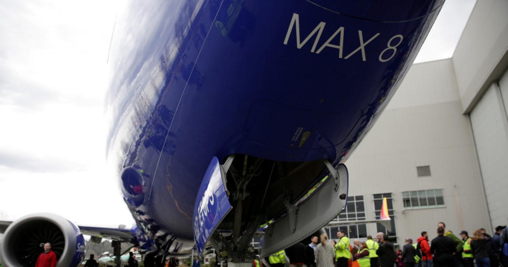 FILE PHOTO: Boeing employees are pictured in front of a 737 MAX 8 produced for Southwest Airlines as Boeing celebrates the 10