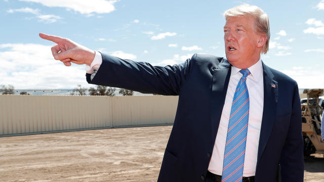U.S. President Donald Trump tours the area around the U.S.-Mexico border wall in Calexico