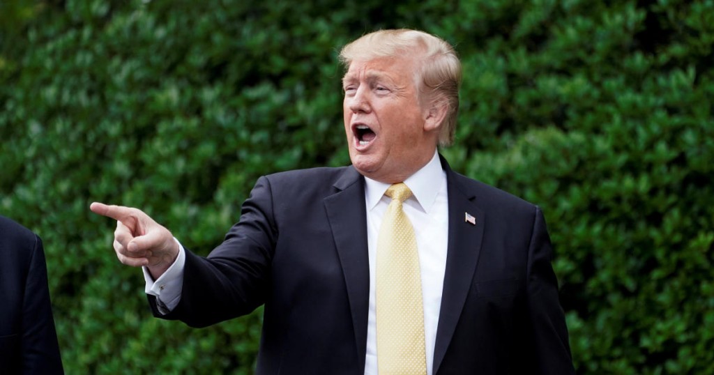 U.S. President Donald Trump points to the crowd as he arrives for an event honoring 2018 NASCAR Cup Series Champion Joey Logano at the White House in Washington
