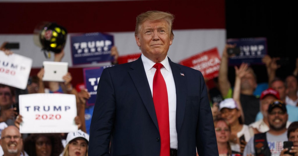 President Donald Trump arrives to speak at a rally at Aaron Bessant Amphitheater