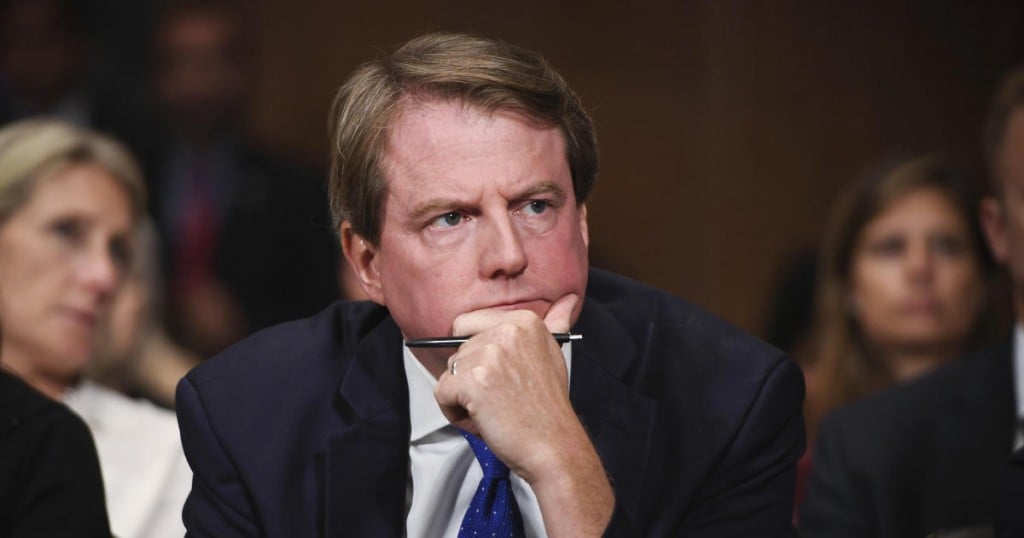 White House counsel Don McGahn listens as Supreme court nominee Brett Kavanaugh testifies before the Senate Judiciary Committee on Capitol Hill in Washington