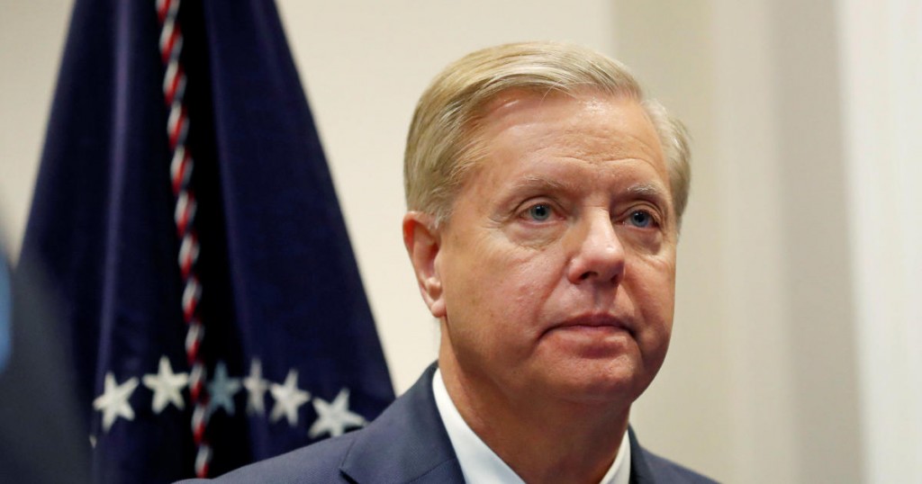 Sen. Lindsey Graham (R-SC) waits for U.S. President Donald Trump to enter the room to speak about the "First Step Act" in the Roosevelt Room at the White House in Washington