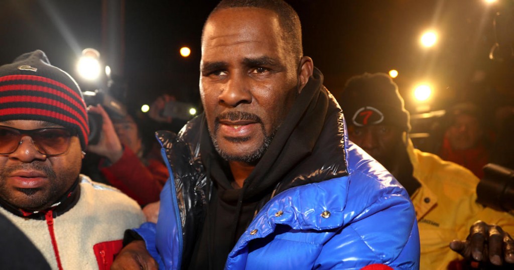 R. Kelly turns himself in at 1st District police headquarters in Chicago on Friday