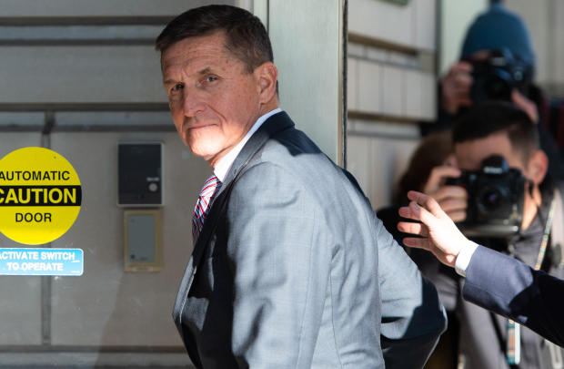 Former US National Security Advisor General Michael Flynn arrives for his sentencing hearing at US District Court in Washington