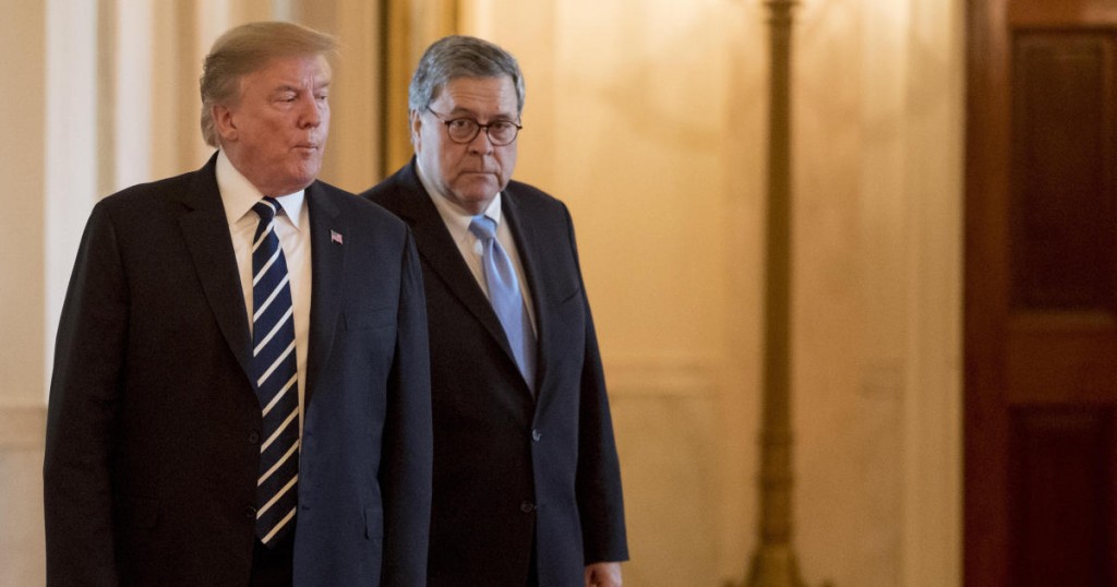 President Donald Trump and Attorney General William Barr arrive for a Public Safety Officer Medal of Valor presentation ceremony in the East Room of the White House in Washington