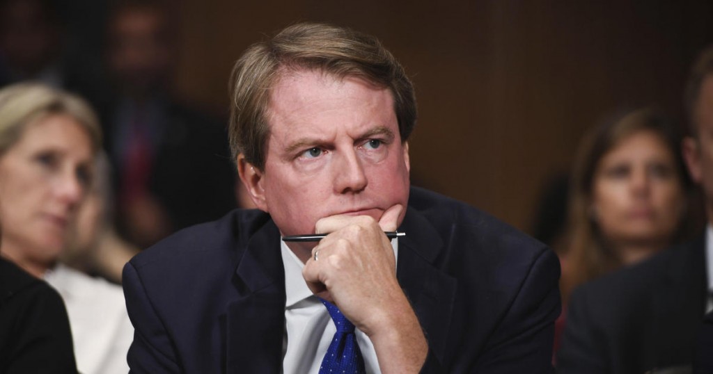 White House counsel Don McGahn listens as Supreme court nominee Brett Kavanaugh testifies before the Senate Judiciary Committee on Capitol Hill in Washington