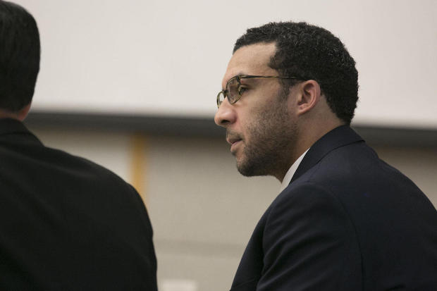 Former NFL football player Kellen Winslow Jr. looks at attorney Marc Carlos during his rape trial