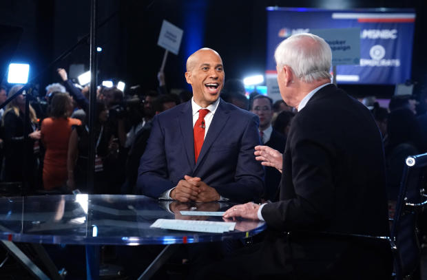 U.S. Senator Cory Booker laughs during an interview with MSNBC host Chris Matthews after   the first U.S. 2020 presidential election Democratic candidates debate in Miami