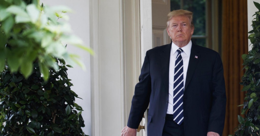 President Donald Trump walks out of the Oval Office to deliver a statement in the Rose Garden of the White House