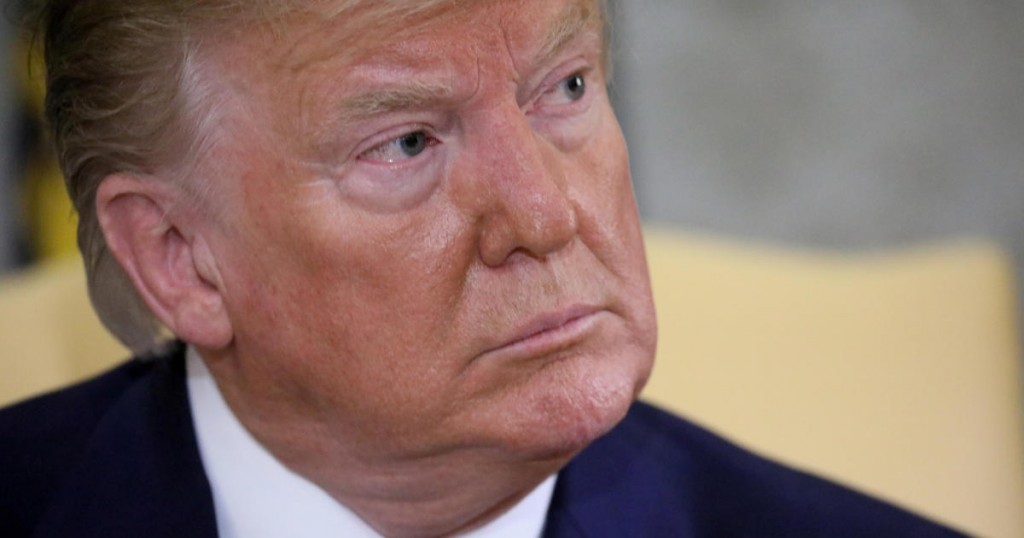 FILE PHOTO: U.S. President Donald Trump listens to questions from reporters during a meeting with Canada's Prime Minister Justin Trudeau in the Oval Office of the White House in Washington