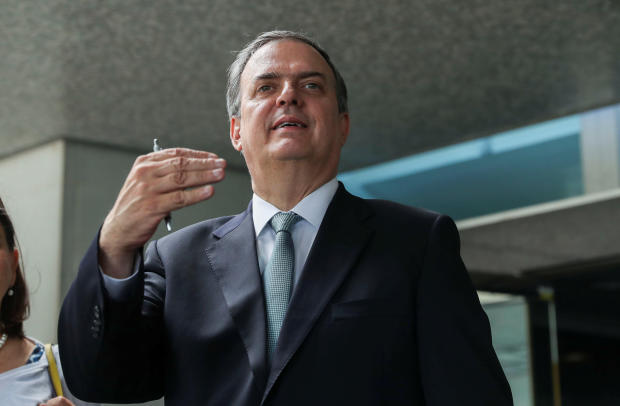 Mexico's Foreign Minister Marcelo Ebrard speaks to reporters after a meeting between U.S. and Mexican officials on immigration and trade at the U.S. State Department in Washington