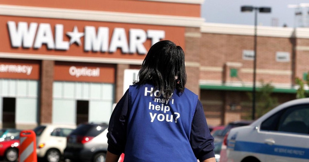 CHICAGO - SEPTEMBER 21:   Wal-Mart employee Anna Hines walks through the parking lot of the soon-to-opened Wal-Mart September 21