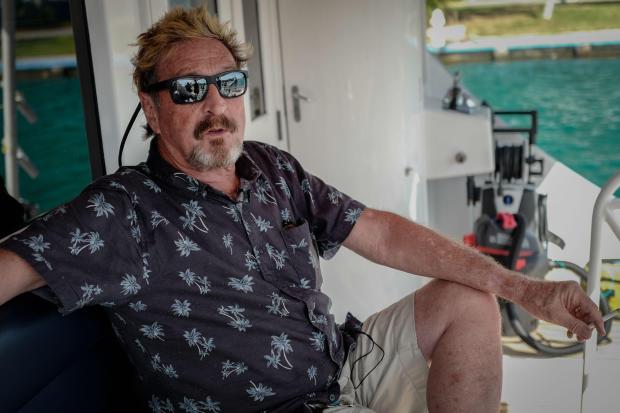 US millionaire John McAfee gestures during an interview with AFP on his yacht anchored at the Marina Hemingway in Havana