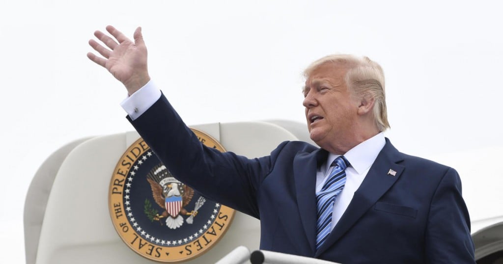 President Donald Trump walks down the steps of Air Force One at Pittsburgh International Airport in Coraopolis