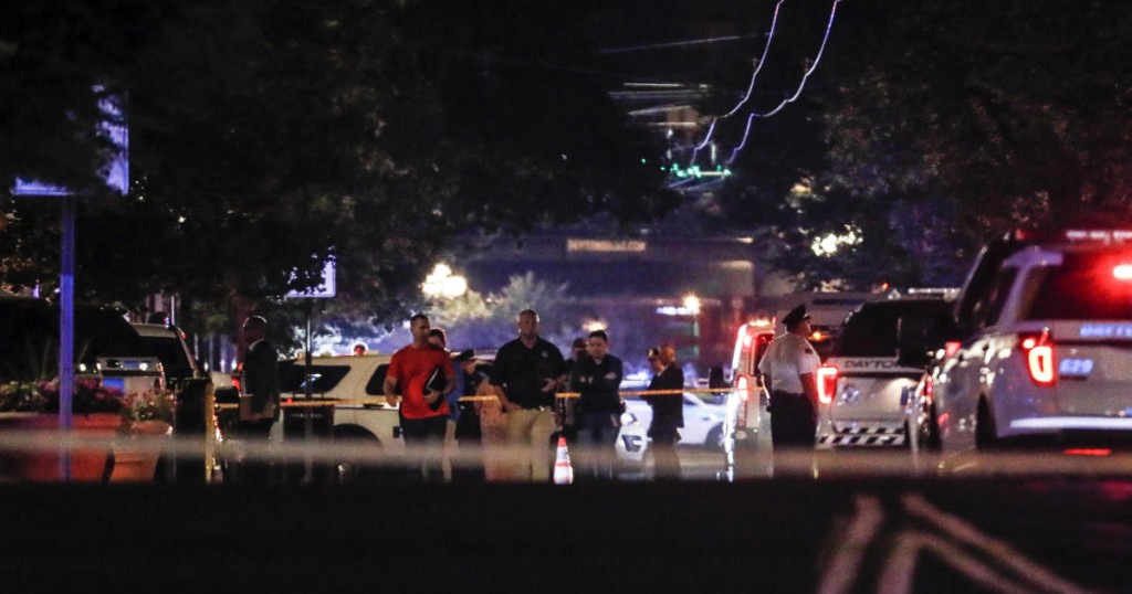 Authorities work the scene of a mass shooting