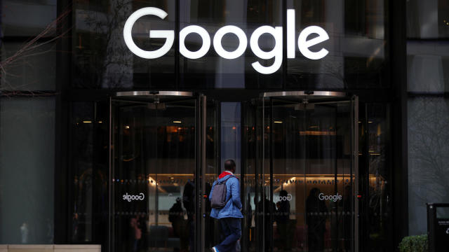The Google logo is pictured at the entrance to the Google offices in London 
