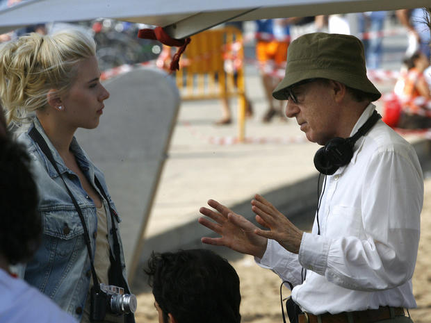 US director Woody Allen (R) speaks to US