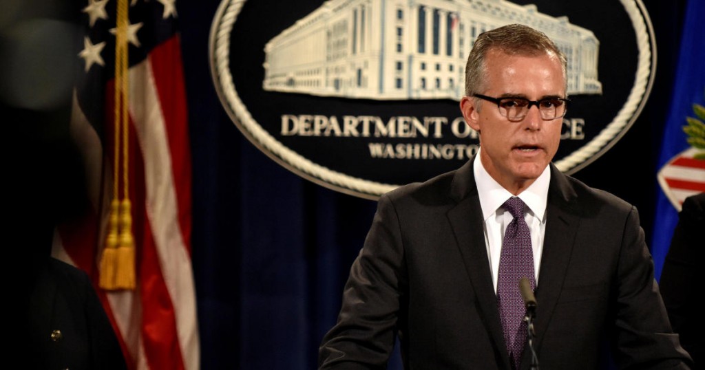 FILE PHOTO - FBI Deputy Director Andrew McCabe details the filing of civil forfeiture complaints seeking the forfeiture and recovery of more than $1 billion in assets associated with an international conspiracy to launder funds misappropriated from a Malaysian sovereign wealth fund 1MDB in Washington July 20