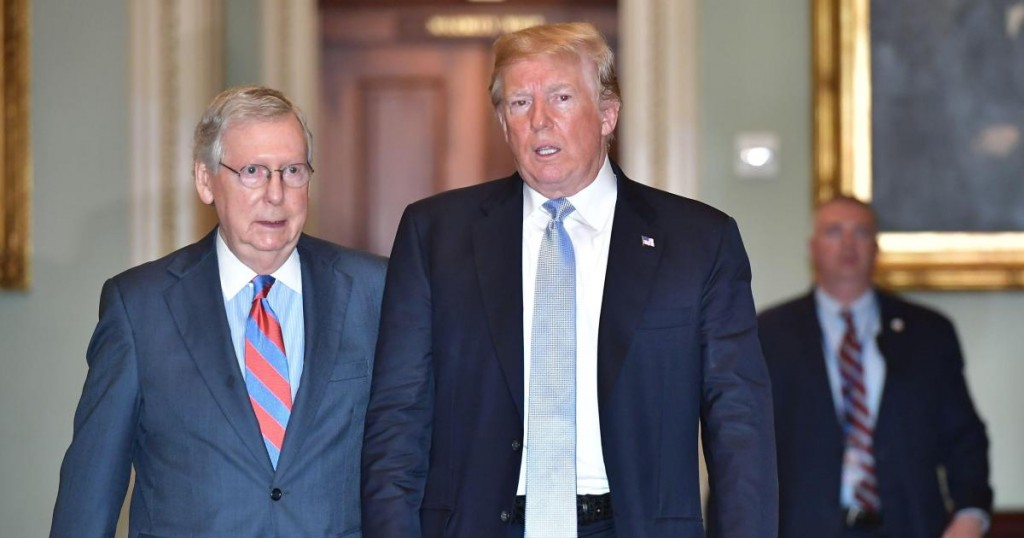 US President Donald Trump and US Senate Majority Leader Mitch McConnell make their way to a Senate Republican policy lunch at the US Capitol in Washington