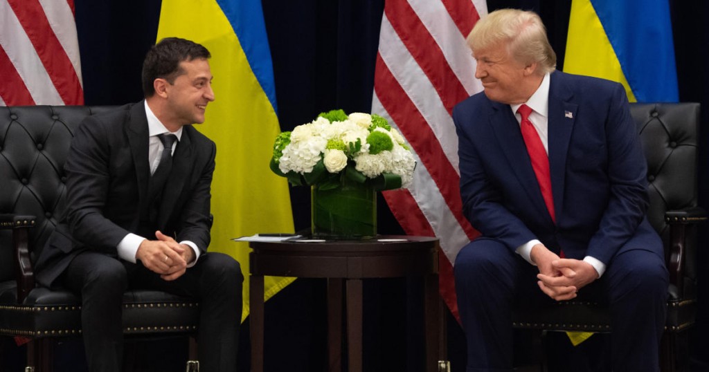 TOPSHOT - US President Donald Trump and Ukrainian President Volodymyr Zelensky speak during a meeting in New York on September 25