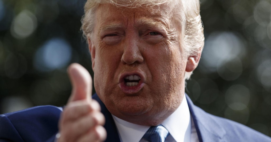 President Donald Trump talks to reporters on the South Lawn of the White House