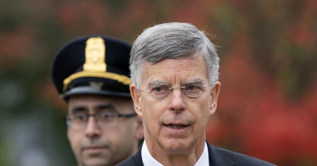 Ambassador William Taylor is escorted by U.S. Capitol Police as he arrives to testify before House committees as part of the Democrats' impeachment investigation of President Donald Trump