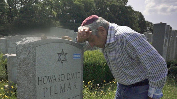 Frank Pilmar at son's grave 