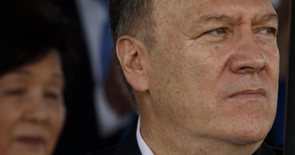 Secretary of State Mike Pompeo looks on during an Armed Forces welcome ceremony for the new chairman of the Joint Chiefs of Staff Gen. Mark Milley