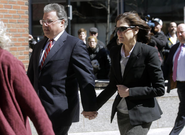 Manuel and Elizabeth Henriquez arrive at federal court in Boston on Wednesday