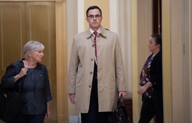 White House Russia expert Timothy Morrison arrives for a deposition for the House Impeachment inquiries at the US Capitol in Washington