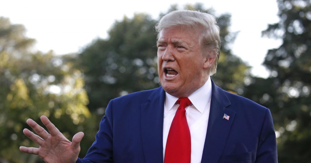 President Donald Trump speaks to members of the media on the South Lawn of the White House in Washington
