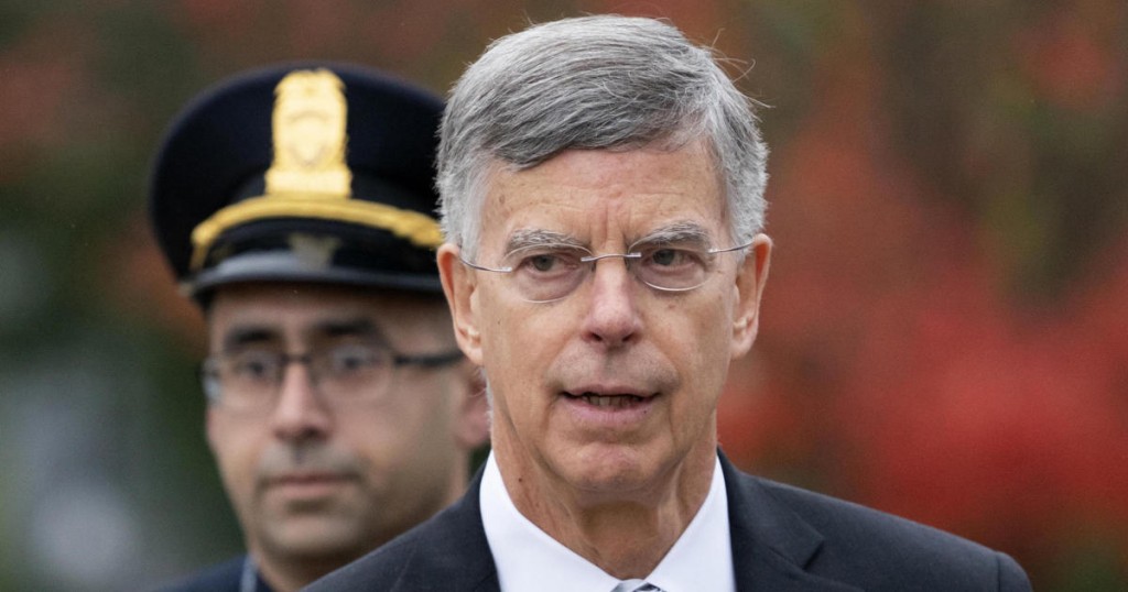 Ambassador William Taylor is escorted by U.S. Capitol Police as he arrives to testify before House committees as part of the Democrats' impeachment investigation of President Donald Trump