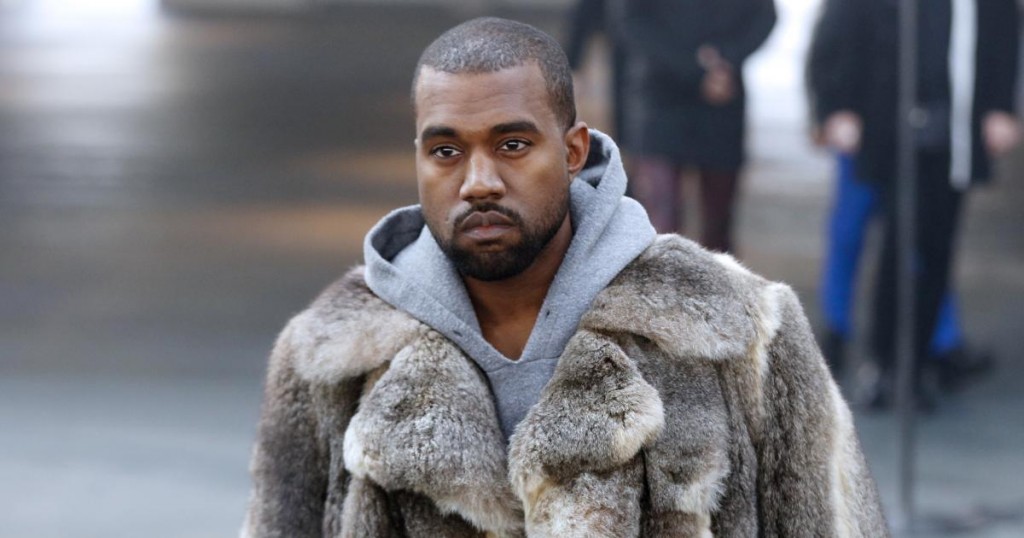 US musician Kanye West arrives to attend Givenchy's Fall/Winter 2014-2015 men's fashion show in Paris on January 17