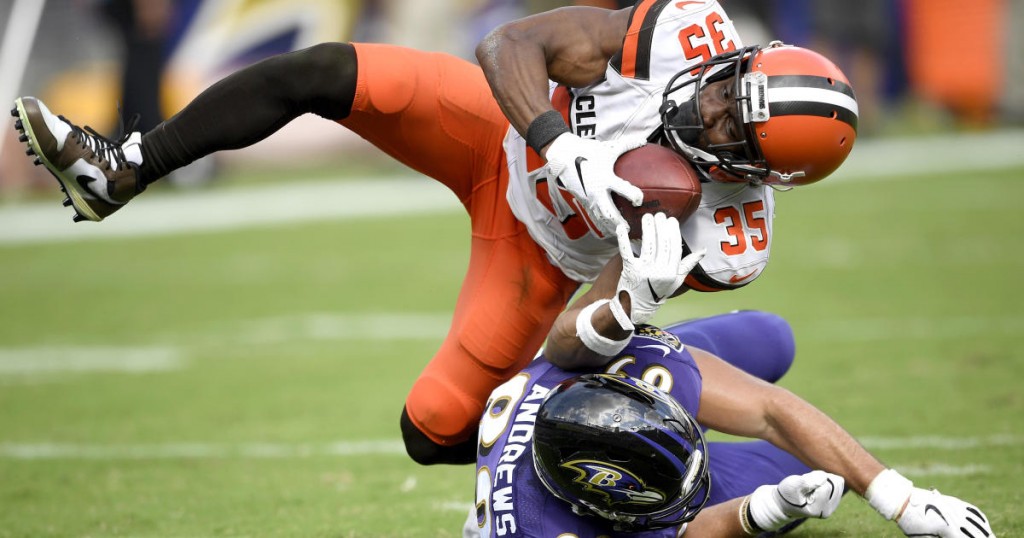 Cleveland Browns defensive back Jermaine Whitehead (35) intercepts a pass from Baltimore Ravens quarterback Lamar Jackson