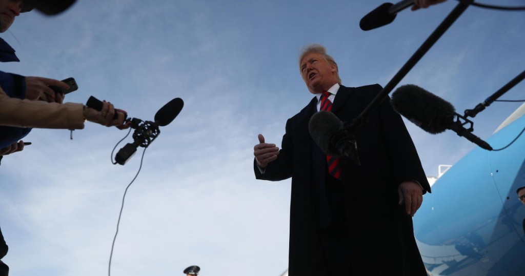 CORRECTS LOCATION TO ANDREWS AIR FORCE BASE - President Donald Trump talks to the media before boarding Air Force One at Andrews Air Force Base