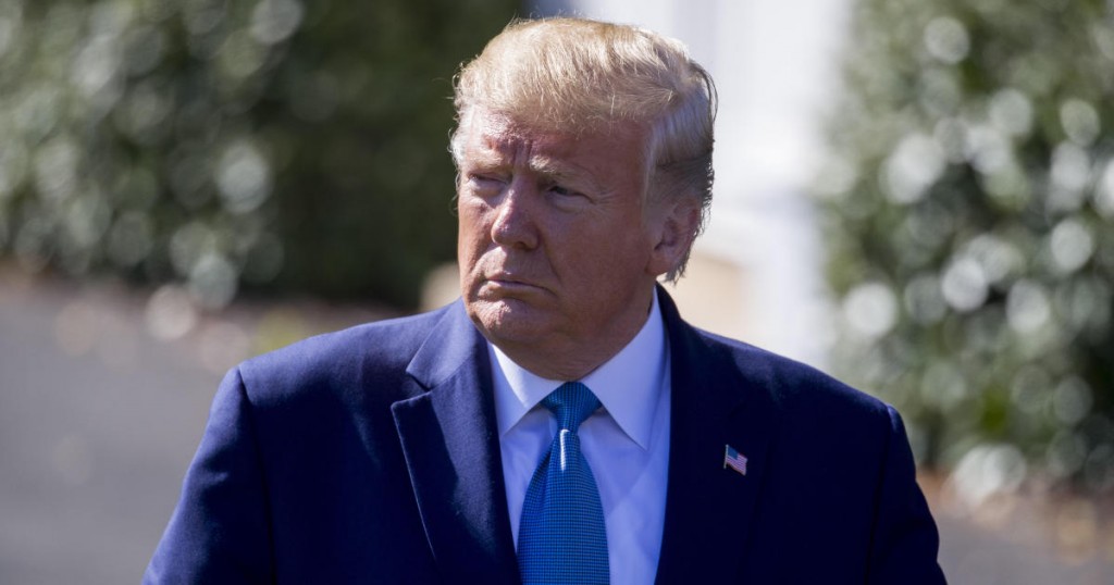 President Donald Trump walks to speak with reporters on the South Lawn of the White House before departing