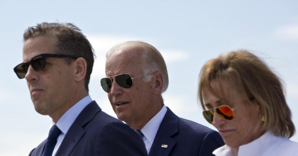 Family members gather for a road naming ceremony with U.S. Vice President Joe Biden