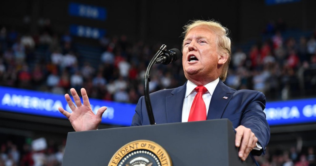 US President Donald Trump gestures as he speaks during a rally at Rupp Arena in Lexington